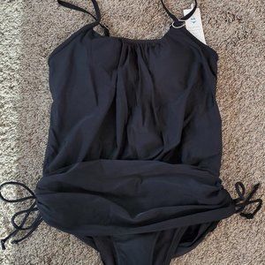 Size Medium. One piece Tummy Control black bathing suit with draw strings.
